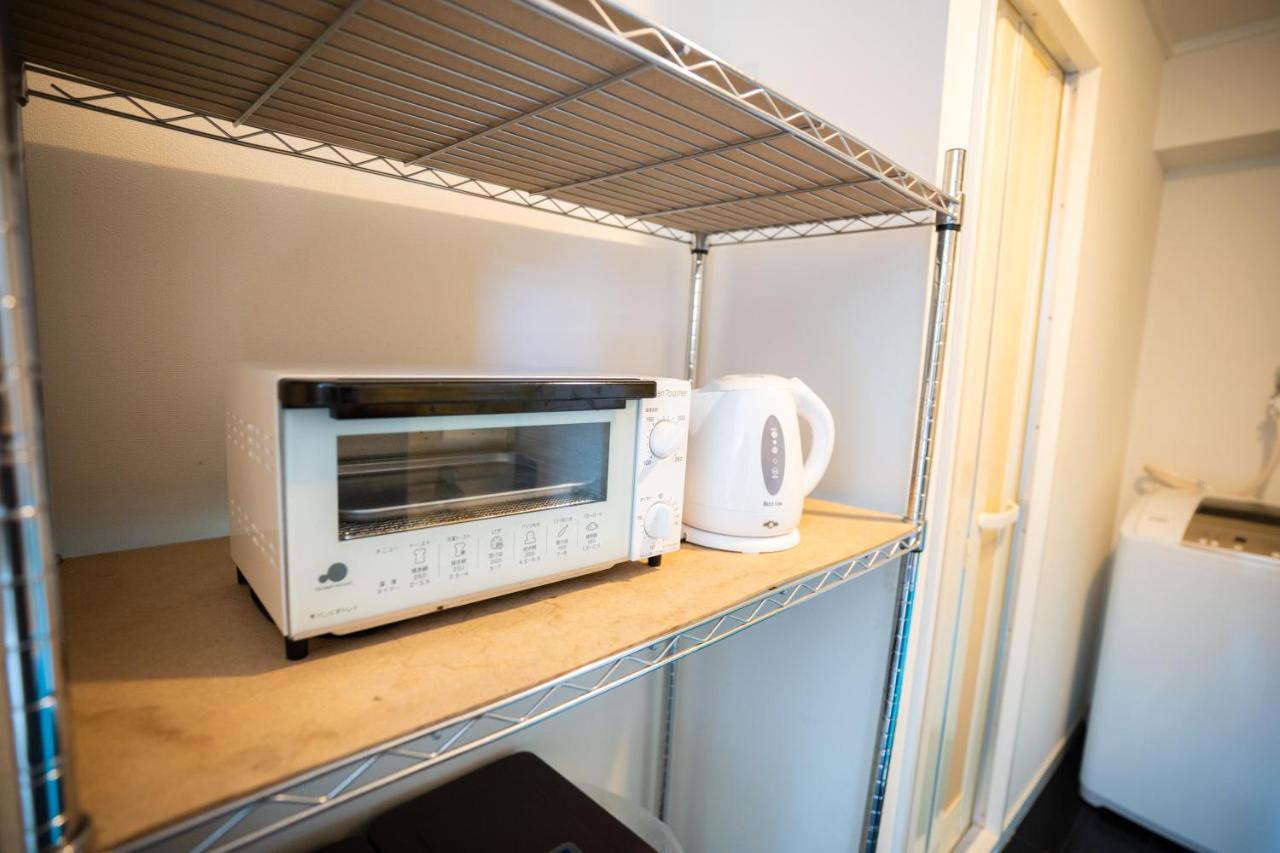 Ferienwohnung スマイルハイツ Naha Exterior foto