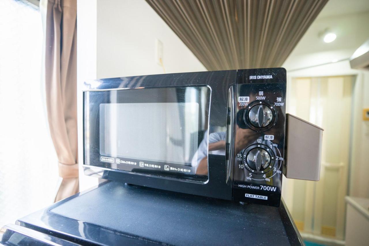 Ferienwohnung スマイルハイツ Naha Exterior foto